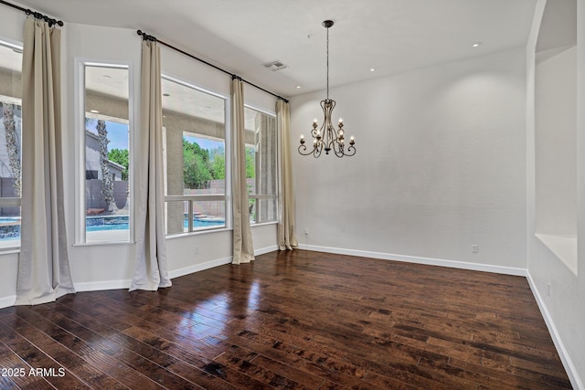 10310 N 135th Way, Scottsdale, AZ 85259 - unfurnished dining area with a chandelier, hardwood / wood-style floors, and recessed lighting