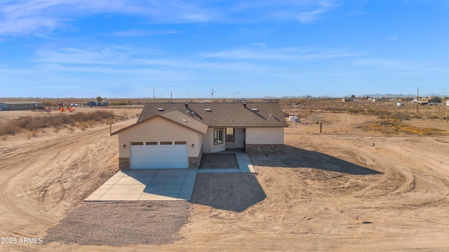 single story home with a garage