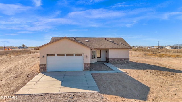 ranch-style home with a garage