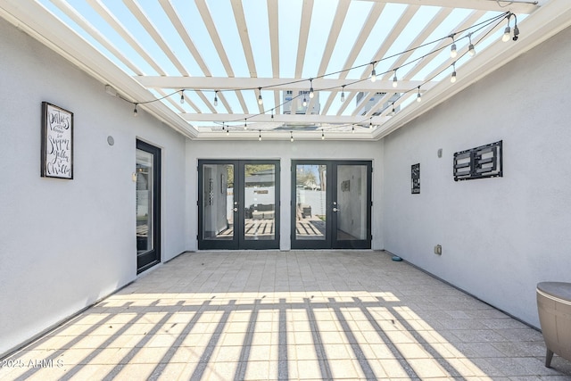 4402 E Montecito Ave, Phoenix, AZ 85018 - unfurnished sunroom featuring french doors