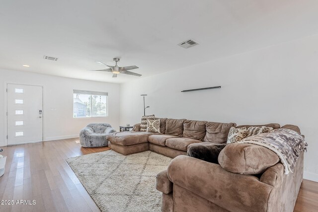 4402 E Montecito Ave, Phoenix, AZ 85018 - living area with light wood-style floors, a ceiling fan, baseboards, and recessed lighting