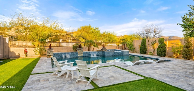 view of swimming pool with a patio, a yard, a fenced backyard, and a fenced in pool