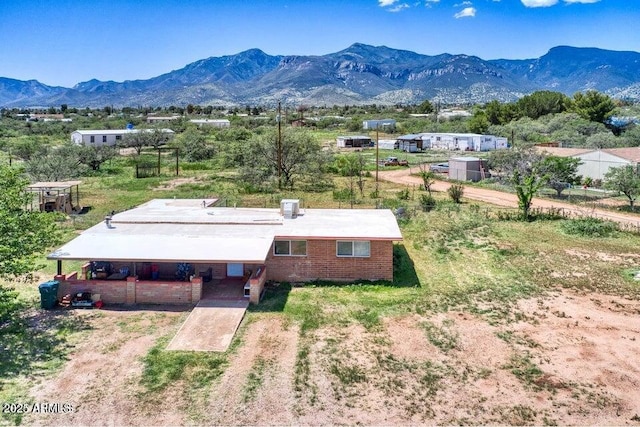 drone / aerial view with a mountain view