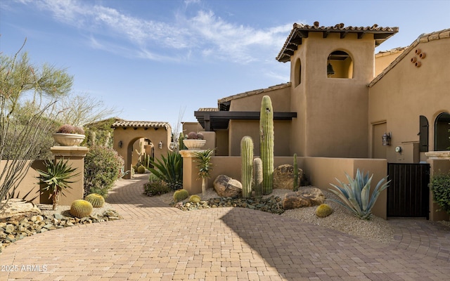 11457 E Salero Dr, Scottsdale, AZ 85262 - view of front facade with a tile roof, fence, and stucco siding
