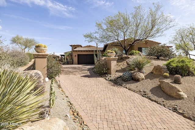 11457 E Salero Dr, Scottsdale, AZ 85262 - view of front facade with an attached garage, decorative driveway, and stucco siding