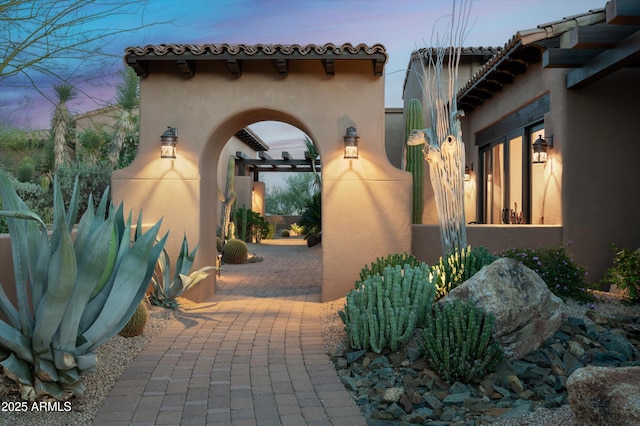 11457 E Salero Dr, Scottsdale, AZ 85262 - view of side of property featuring a patio area, stucco siding, and a tile roof