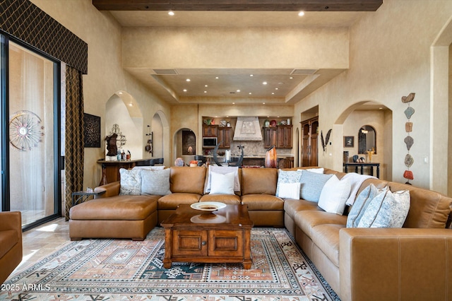 11457 E Salero Dr, Scottsdale, AZ 85262 - living area featuring recessed lighting, arched walkways, and a towering ceiling
