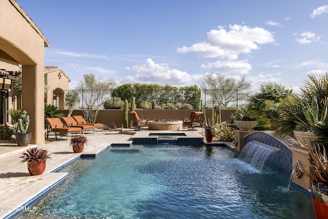11457 E Salero Dr, Scottsdale, AZ 85262 - view of swimming pool featuring a fire pit, a patio area, a pool with connected hot tub, and fence