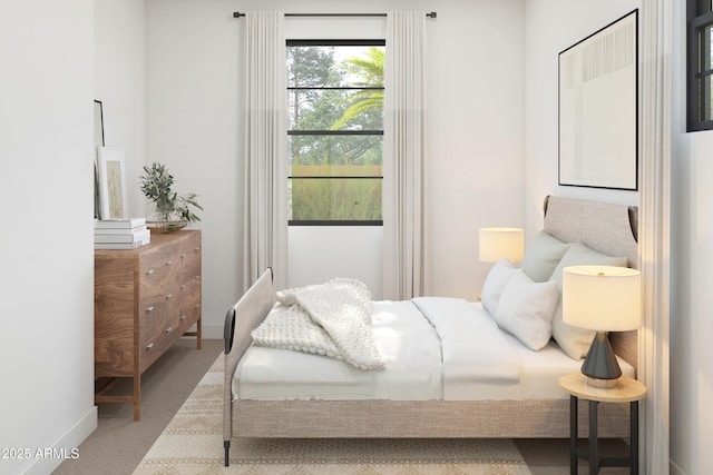 bedroom featuring light colored carpet