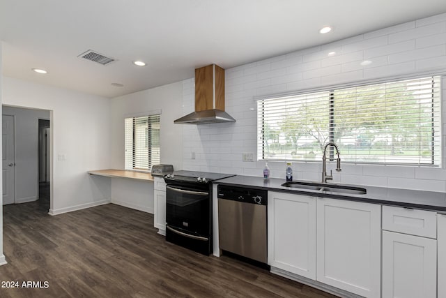 kitchen featuring dishwasher, decorative backsplash, sink, range with electric cooktop, and wall chimney range hood