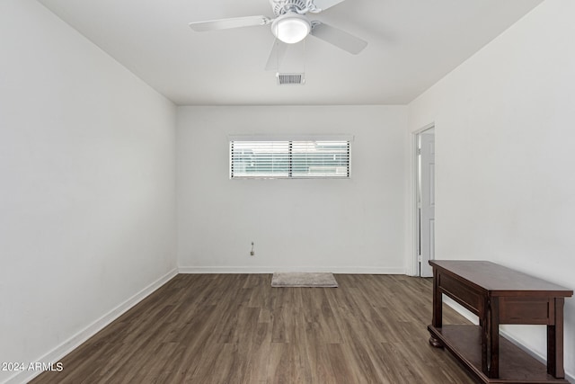 unfurnished room featuring ceiling fan and wood-type flooring