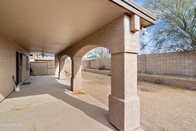 view of patio featuring ceiling fan