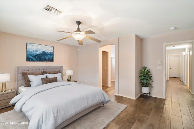 bedroom featuring ceiling fan and hardwood / wood-style floors