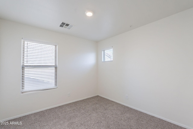 8854 W Aster Dr, Peoria, AZ 85381 - carpeted empty room featuring baseboards