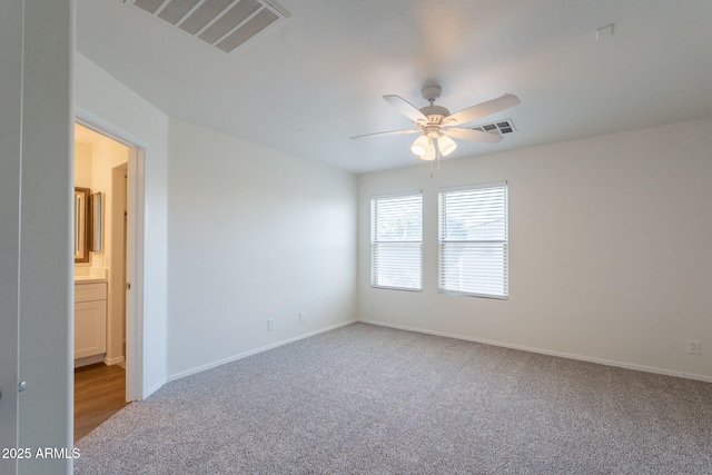 8854 W Aster Dr, Peoria, AZ 85381 - empty room featuring carpet, ceiling fan, and baseboards