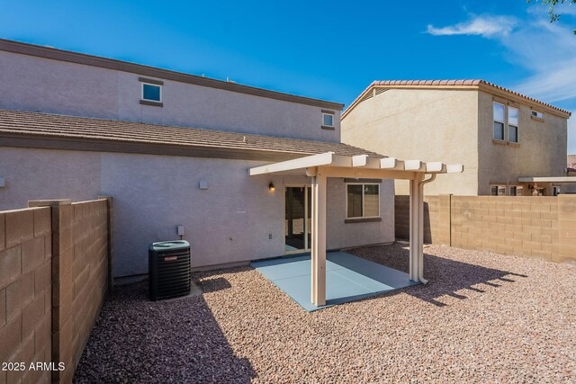 8854 W Aster Dr, Peoria, AZ 85381 - rear view of property with stucco siding, a fenced backyard, central AC unit, a patio, and a tiled roof