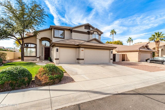 view of front of home with a garage