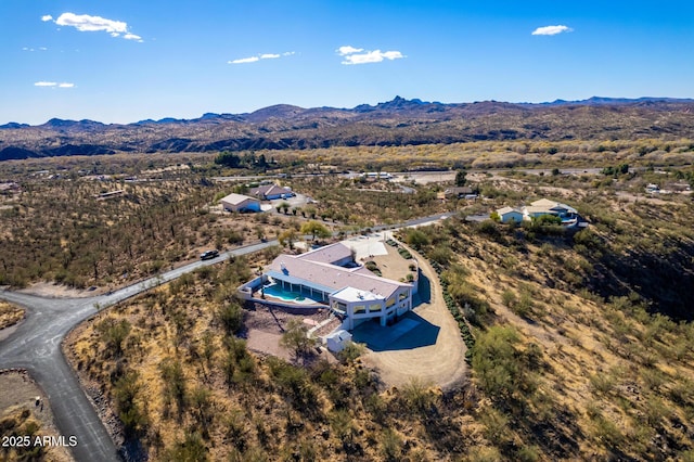 bird's eye view with a mountain view