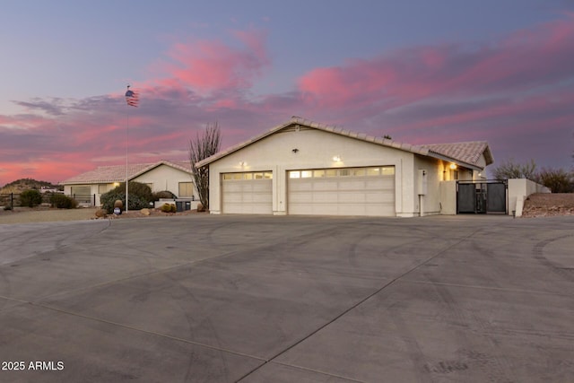 single story home with a garage