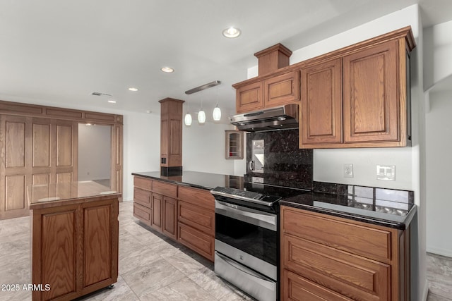 kitchen featuring backsplash, decorative light fixtures, a center island, and stainless steel range with electric cooktop