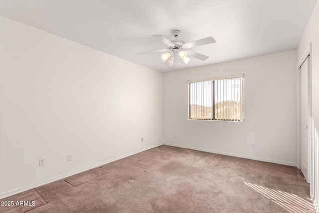 unfurnished bedroom with light carpet and ceiling fan