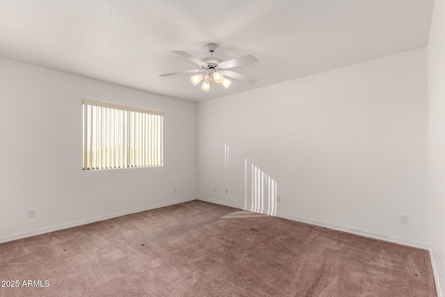 carpeted empty room with ceiling fan