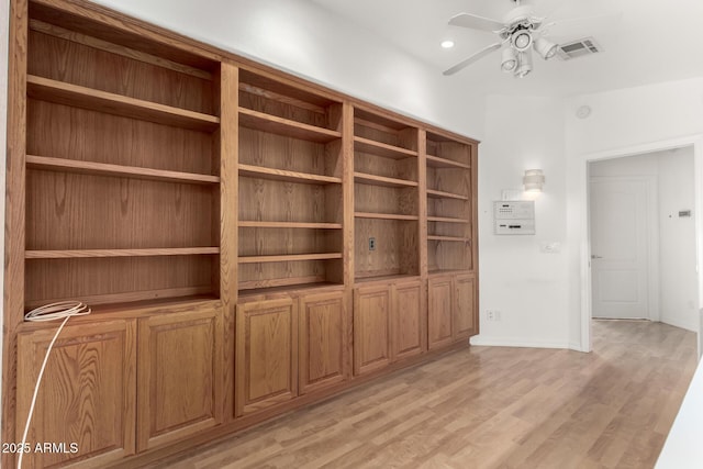 interior space featuring ceiling fan and light hardwood / wood-style flooring