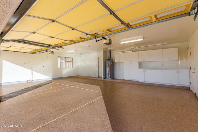 garage featuring ceiling fan, water heater, and a garage door opener