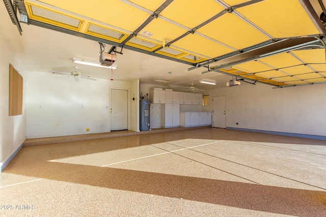 garage with ceiling fan, electric water heater, and a garage door opener