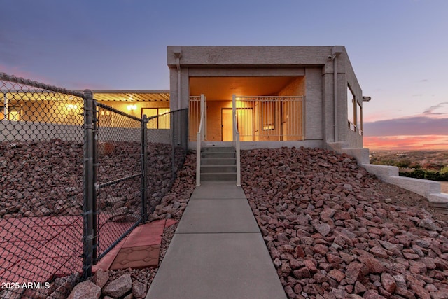 view of property exterior at dusk