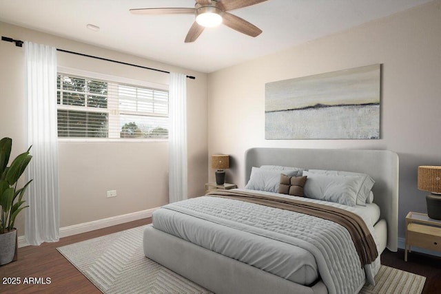 bedroom featuring ceiling fan and dark wood-type flooring