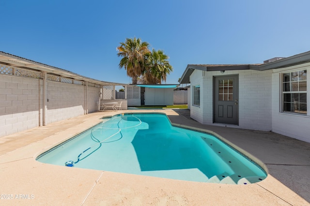 view of pool featuring a fenced backyard, a patio, and a fenced in pool