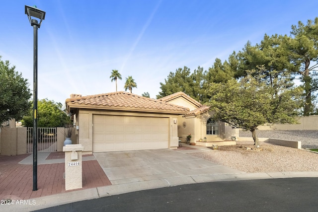 view of front of property with a garage