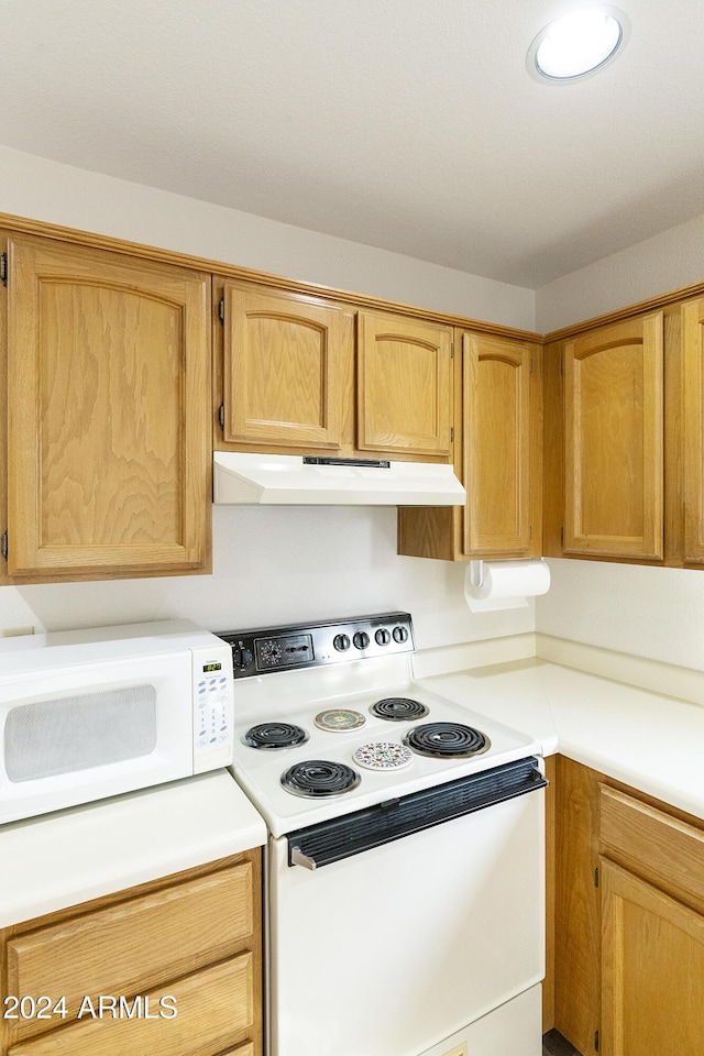 kitchen featuring white appliances