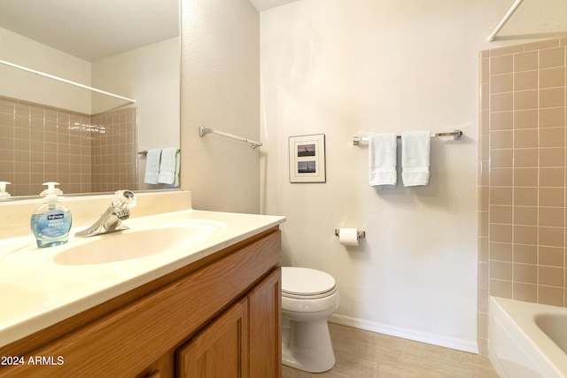 full bathroom with vanity, toilet, and tiled shower / bath combo