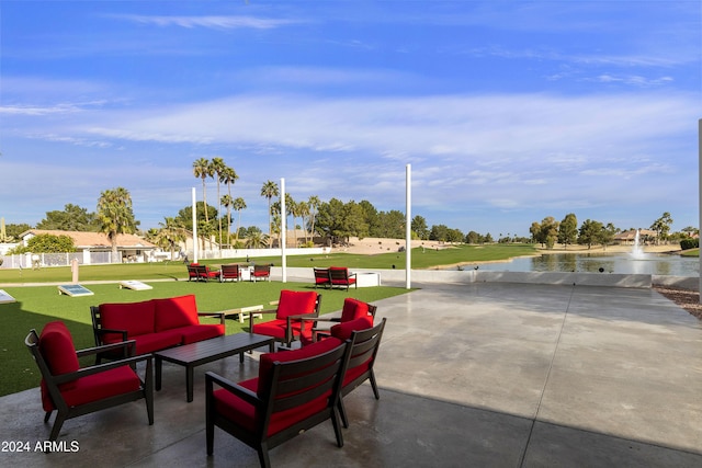 view of patio featuring a water view and an outdoor hangout area