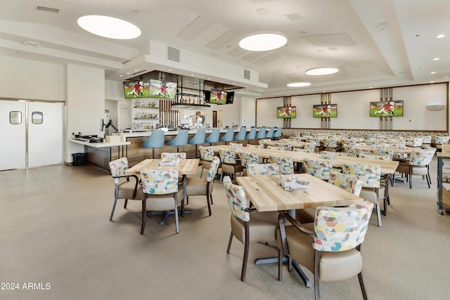 dining room with a tray ceiling