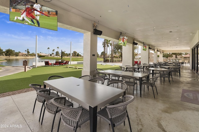 view of patio / terrace featuring a water view