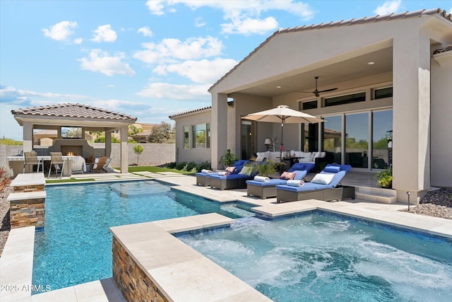 8396 E Granite Pass Rd, Scottsdale, AZ 85266 - view of pool with an outdoor living space with a fireplace, a patio area, a ceiling fan, and a pool with connected hot tub
