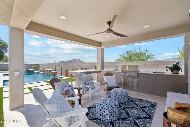8396 E Granite Pass Rd, Scottsdale, AZ 85266 - fenced backyard featuring a ceiling fan, a sink, and a patio area