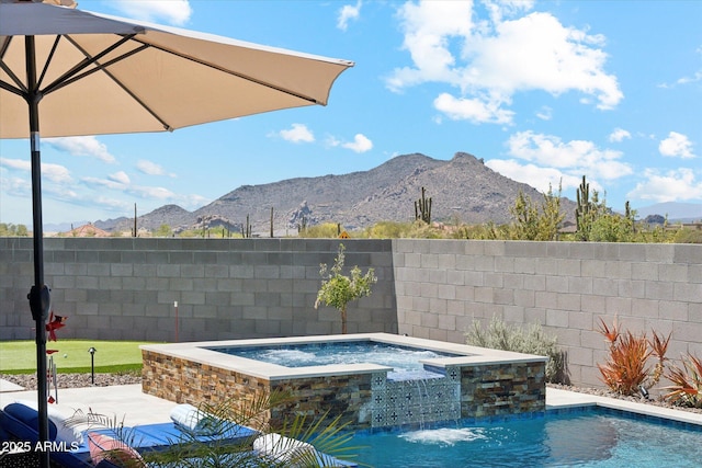 8396 E Granite Pass Rd, Scottsdale, AZ 85266 - view of pool with a mountain view, a pool with connected hot tub, and a patio area