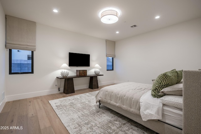 bedroom featuring light hardwood / wood-style floors