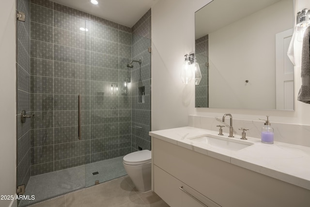 bathroom featuring vanity, toilet, tile patterned floors, and walk in shower