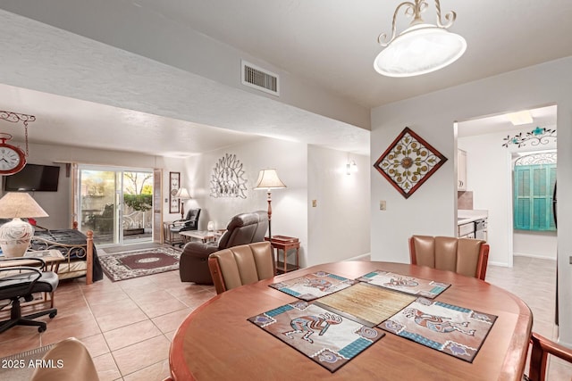 dining room with light tile patterned floors