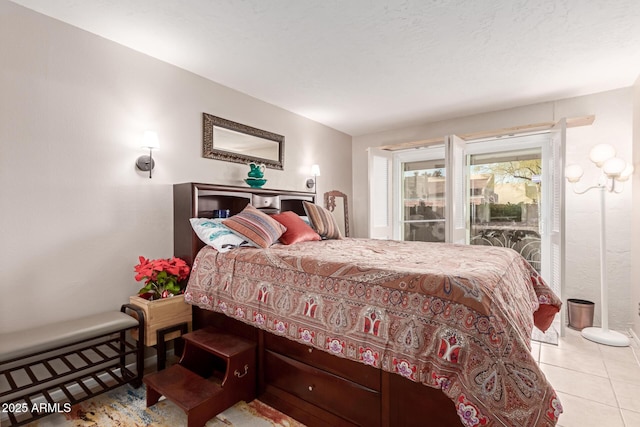 bedroom featuring light tile patterned floors