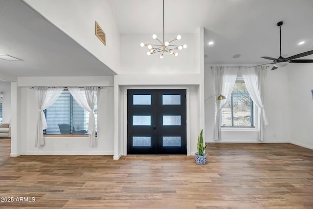 35005 N Central Ave, Phoenix, AZ 85086 - entrance foyer featuring a chandelier, wood finished floors, baseboards, recessed lighting, and a ceiling fan