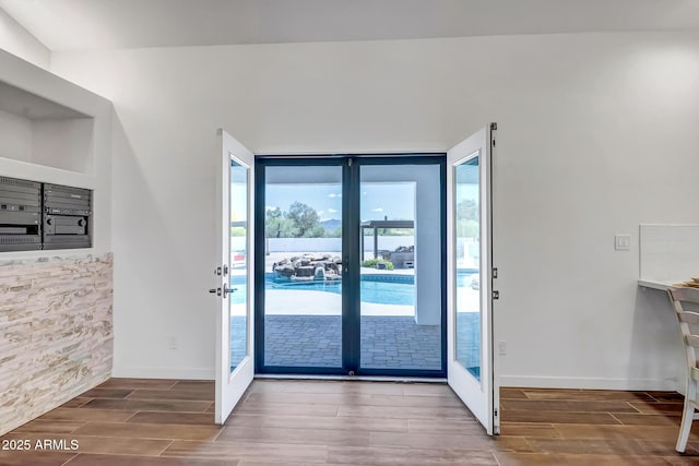 35005 N Central Ave, Phoenix, AZ 85086 - doorway featuring wood tiled floors and baseboards