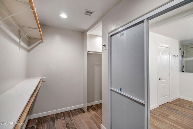 35005 N Central Ave, Phoenix, AZ 85086 - spacious closet featuring wood tiled floors