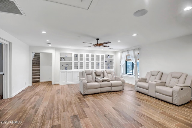 35005 N Central Ave, Phoenix, AZ 85086 - living area with light wood finished floors, baseboards, stairs, a ceiling fan, and recessed lighting