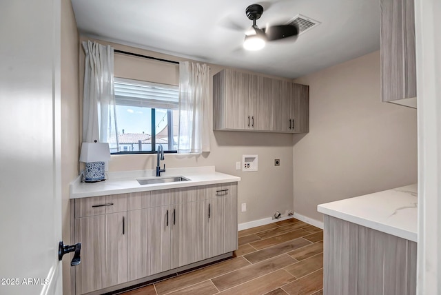 35005 N Central Ave, Phoenix, AZ 85086 - laundry area featuring hookup for a washing machine, ceiling fan, baseboards, electric dryer hookup, and cabinet space